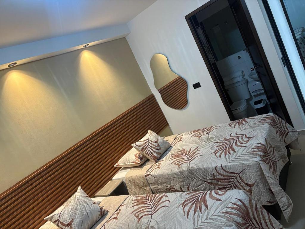 Postel nebo postele na pokoji v ubytování Hotel Lesus