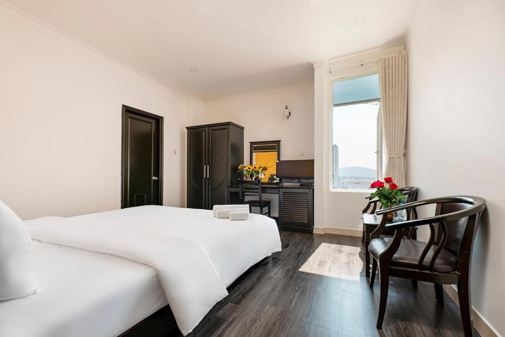Postel nebo postele na pokoji v ubytování Hold Amanda Boutique Hotel