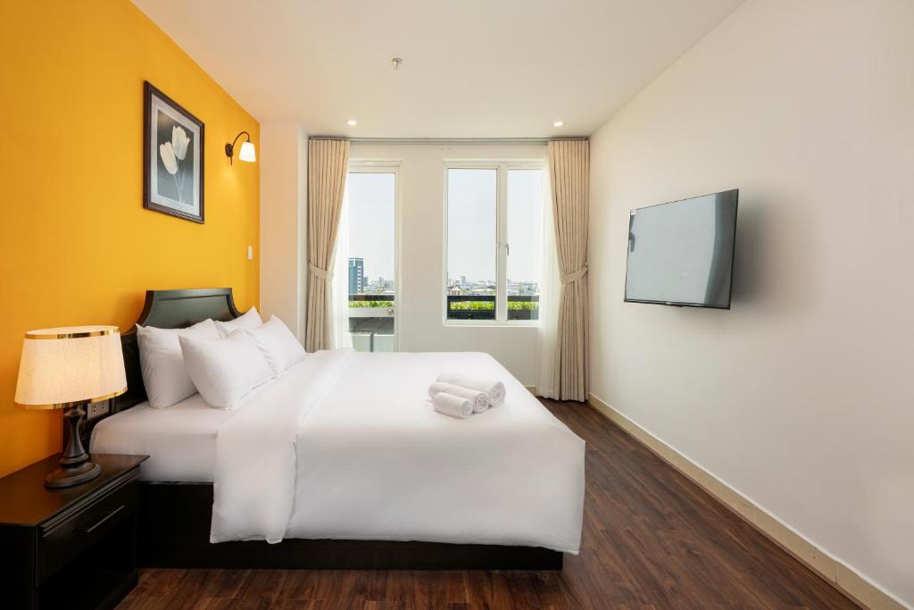TV a/nebo společenská místnost v ubytování Hold Amanda Boutique Hotel