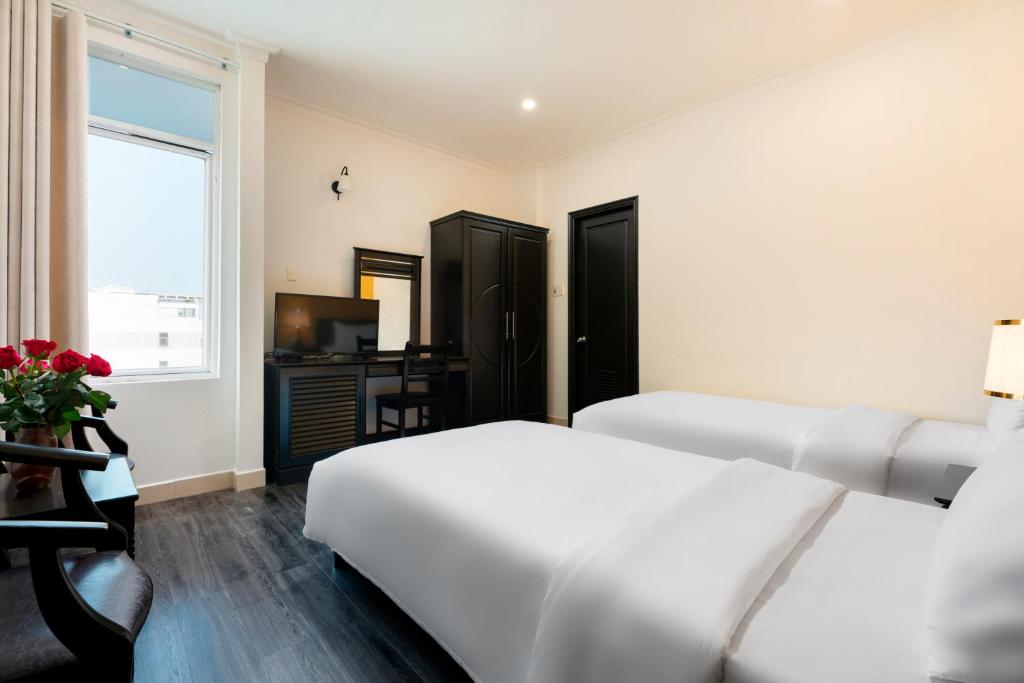 Postel nebo postele na pokoji v ubytování Hold Amanda Boutique Hotel