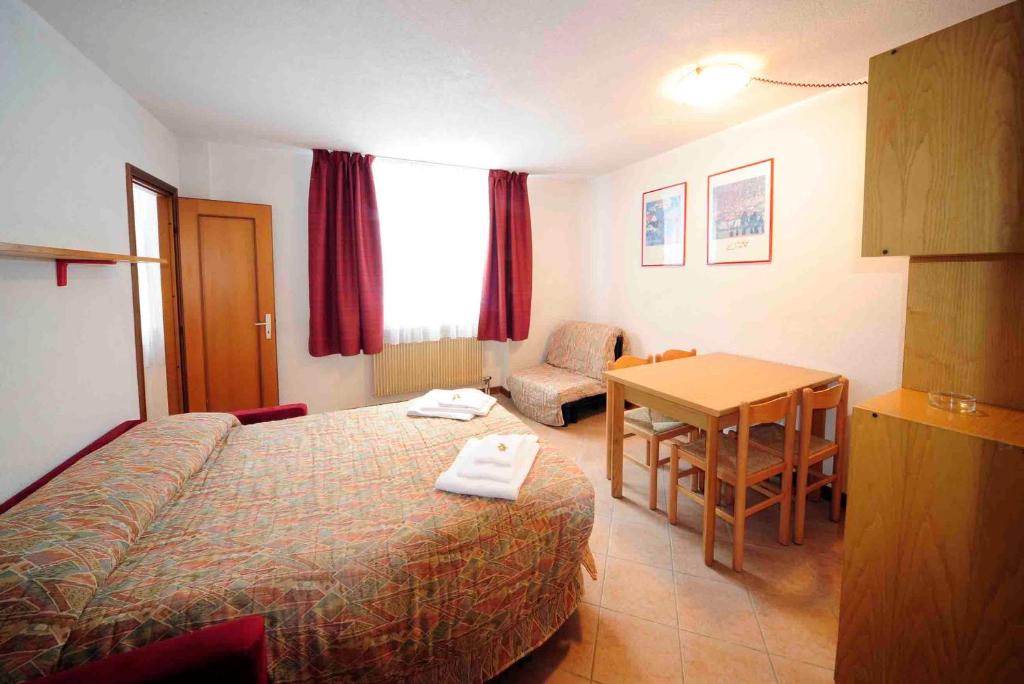 Postel nebo postele na pokoji v ubytování Residence Kristall