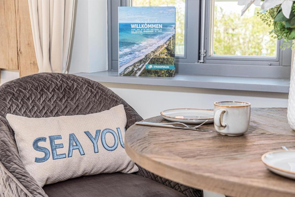 Posezení v ubytování Ferienhaussiedlung Strandperlen Sanddornhof 2d (Typ I)