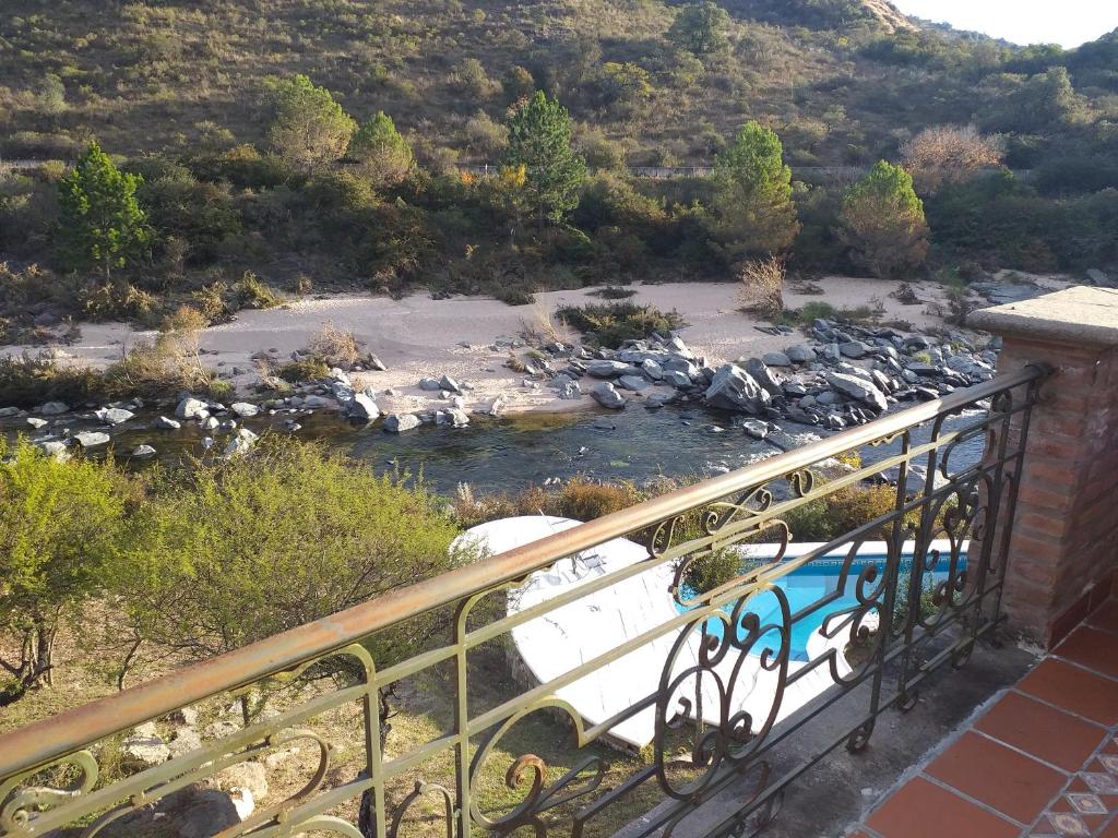 a view of a river from a balcony at Lagriega in Cuesta Blanca