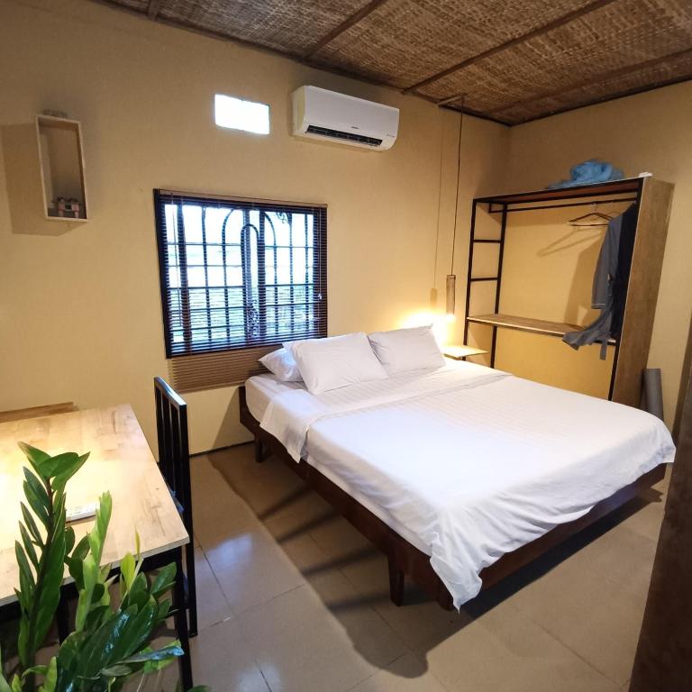 Postel nebo postele na pokoji v ubytování Siem Reap Homesteading