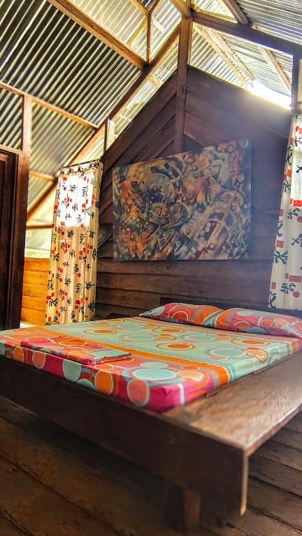 Postel nebo postele na pokoji v ubytování Paraíso Ayahuasca Hotel & Tours