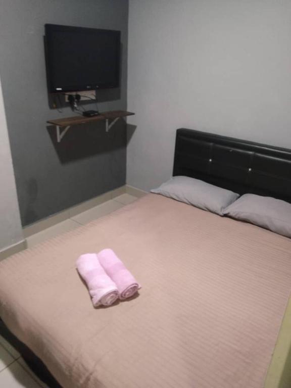 Postel nebo postele na pokoji v ubytování Ho Hotel Block C
