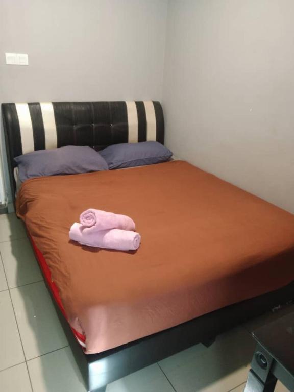 Postel nebo postele na pokoji v ubytování Ho Hotel Block C