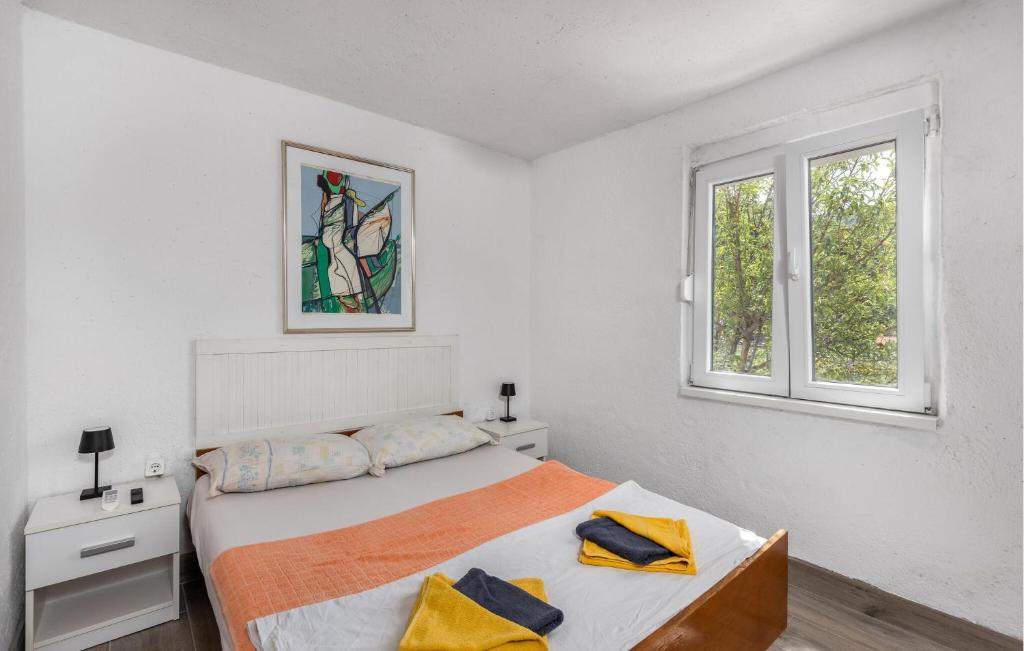 Posteľ alebo postele v izbe v ubytovaní Beach Front Home In Klada