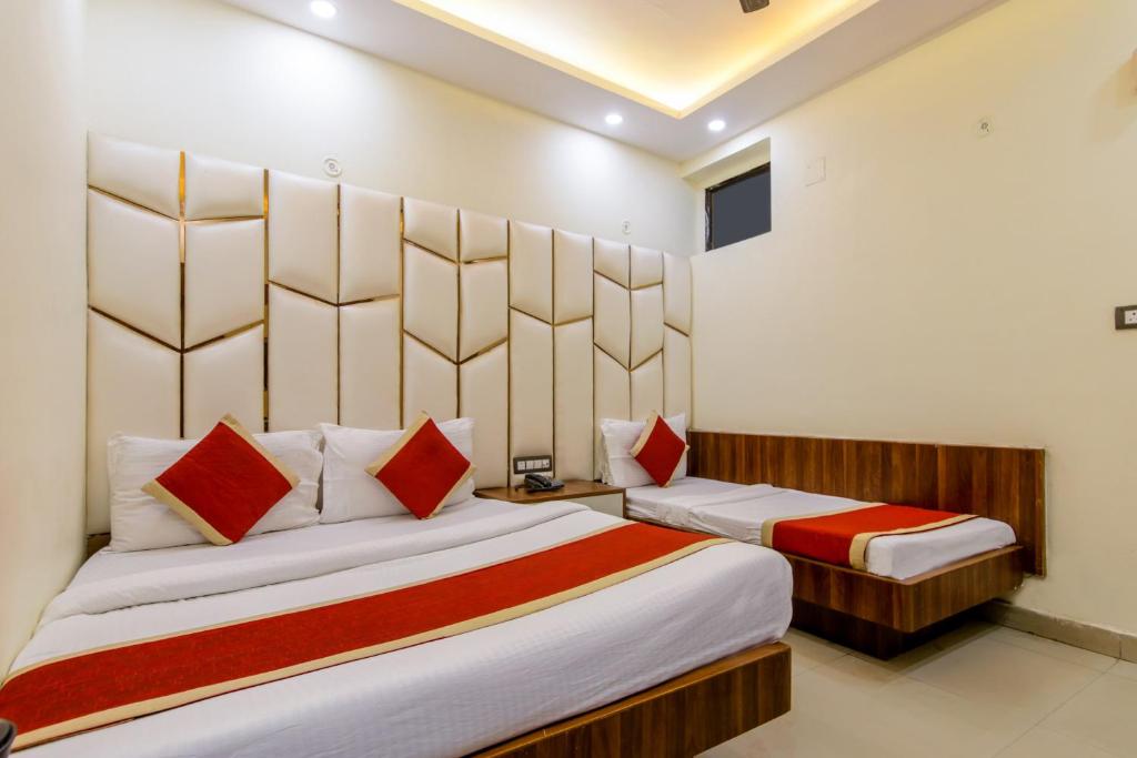 Letto o letti in una camera di SONA NEW DELHI RAILWAY Station