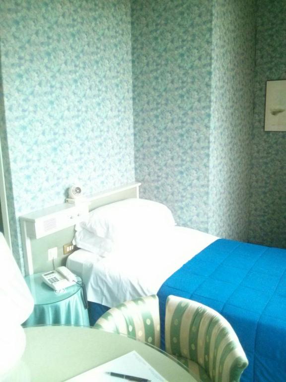Postel nebo postele na pokoji v ubytování Hotel Il Burchiello