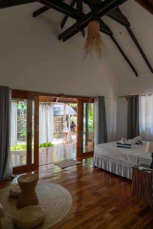 Postel nebo postele na pokoji v ubytování U Story Resort