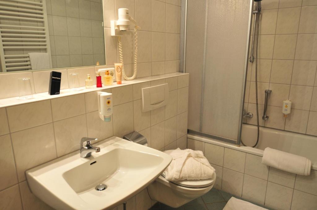 Koupelna v ubytování Akzent Hotel Schranne
