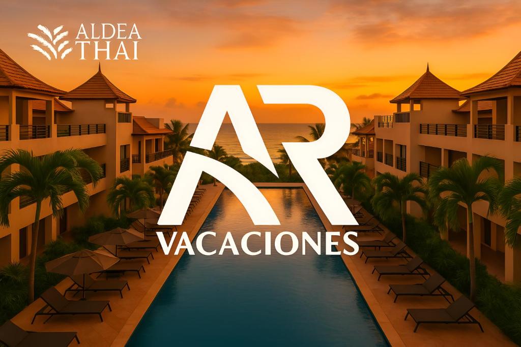 ein Bild eines Resorts mit den Worten „ay vacaciones“ in der Unterkunft Awesome apartment at Aldea Thai Beachfront in Playa del Carmen
