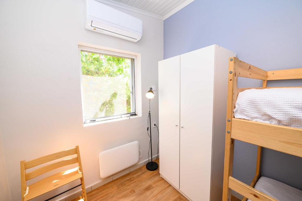 Postel nebo postele na pokoji v ubytování Salty Noses Beach House Paradise Perfect for Families