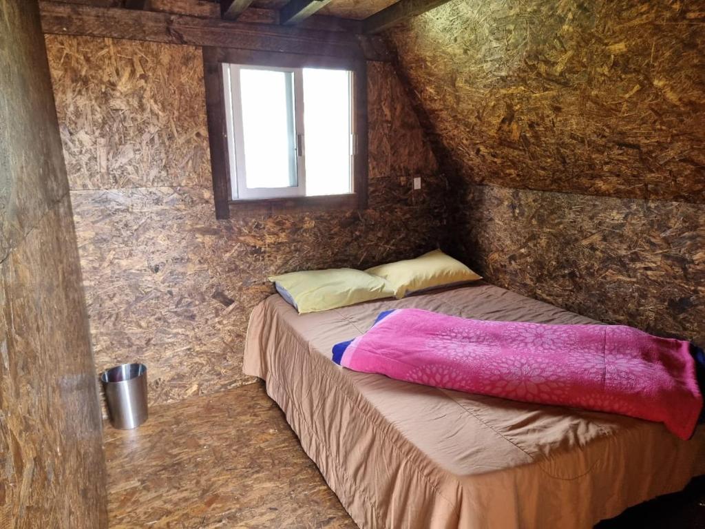 Postel nebo postele na pokoji v ubytování Valle Colibrí