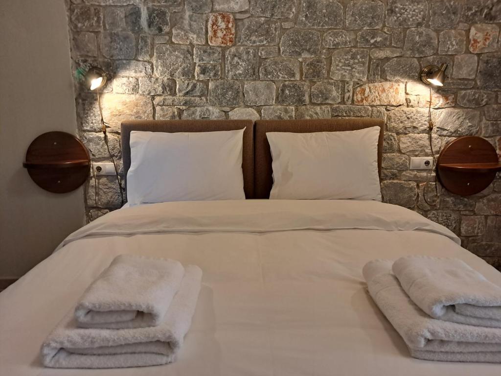 Postel nebo postele na pokoji v ubytování Aeriko Guest House