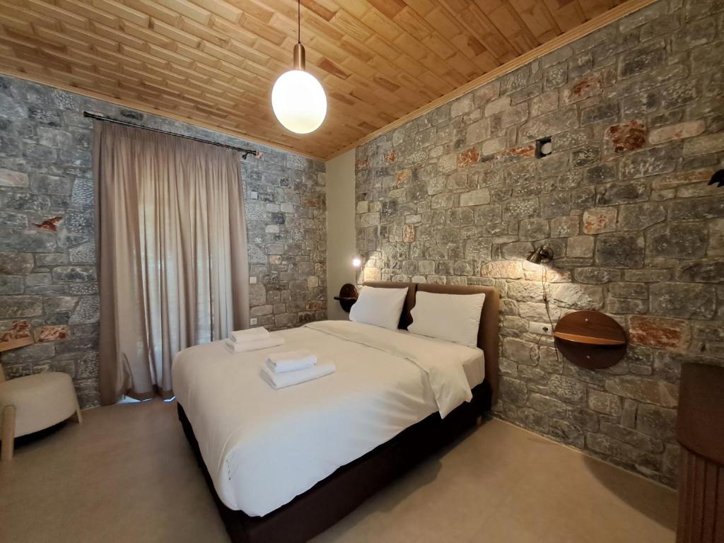 Postel nebo postele na pokoji v ubytování Aeriko Guest House