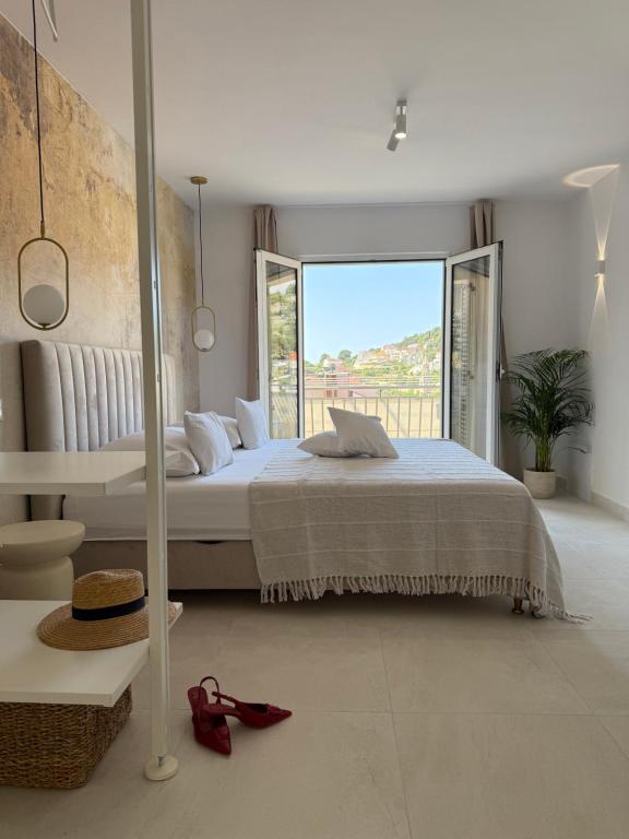 Postel nebo postele na pokoji v ubytování Oleander Apartment & Room Centar