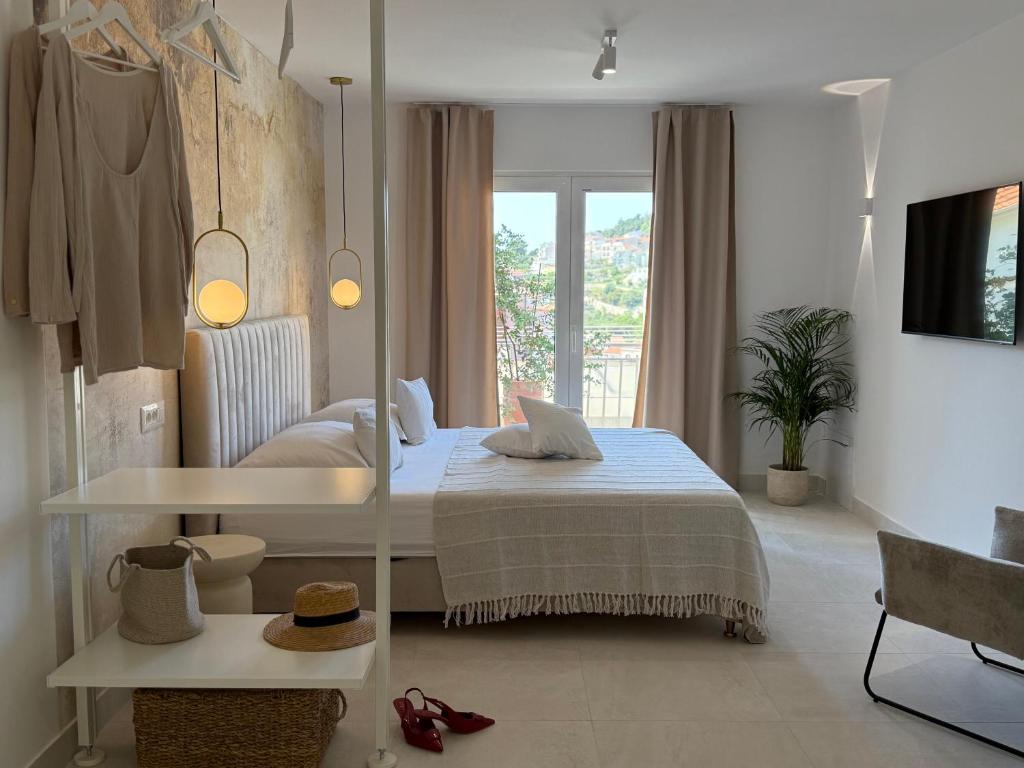 Postel nebo postele na pokoji v ubytování Oleander Apartment & Room Centar