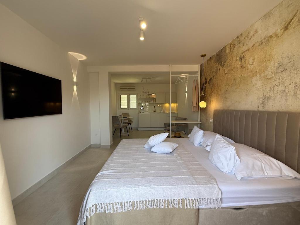 Postel nebo postele na pokoji v ubytování Oleander Apartment & Room Centar