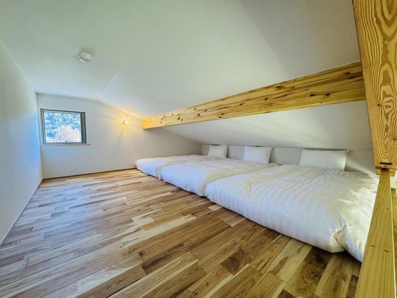 Postel nebo postele na pokoji v ubytování Passage LODGE by Jade Group