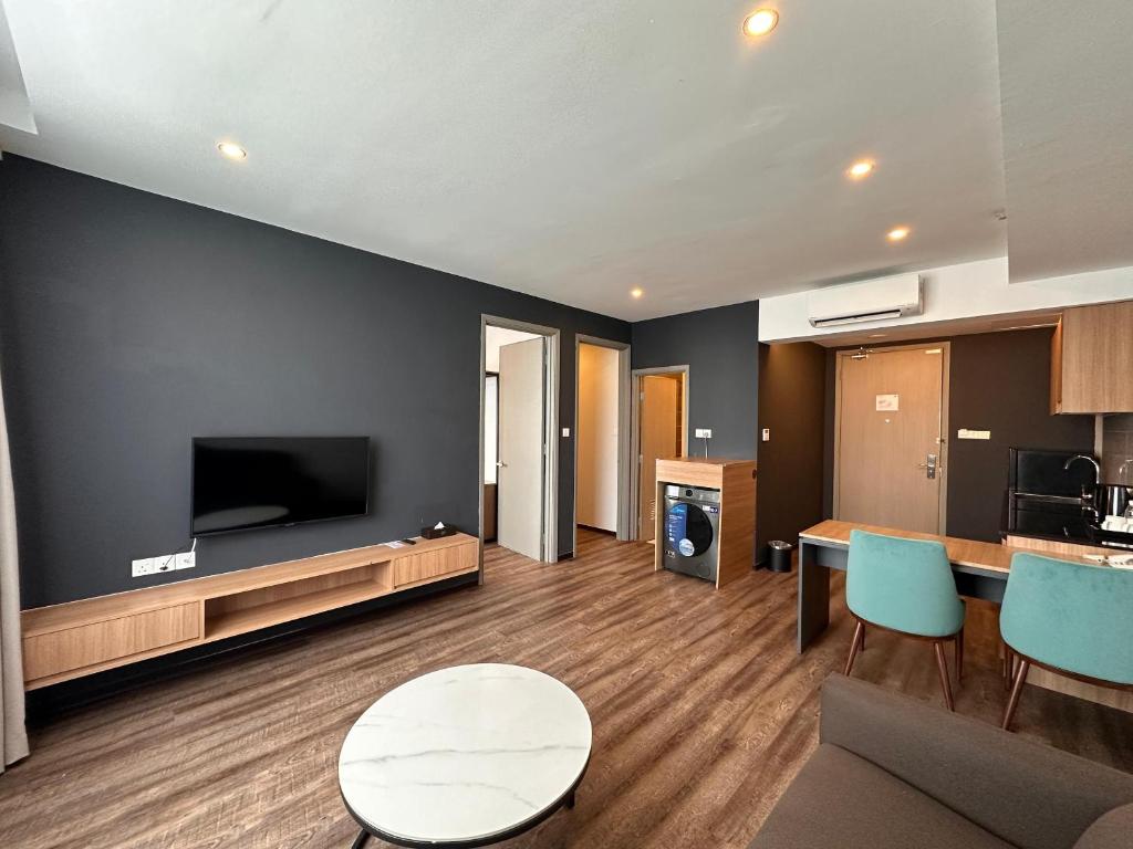 TV a/nebo společenská místnost v ubytování 56 Hotel