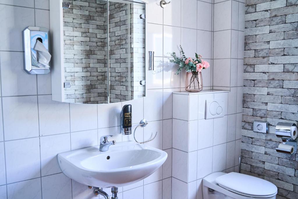 Koupelna v ubytování Hotel Maximo