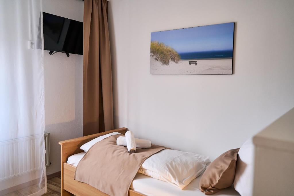 Postel nebo postele na pokoji v ubytování Hotel Maximo