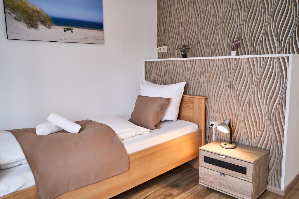 Postel nebo postele na pokoji v ubytování Hotel Maximo