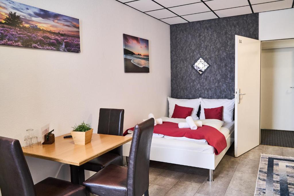 Postel nebo postele na pokoji v ubytování Hotel Maximo