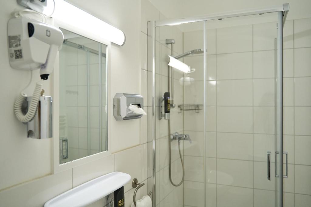 Koupelna v ubytování Hotel Maximo
