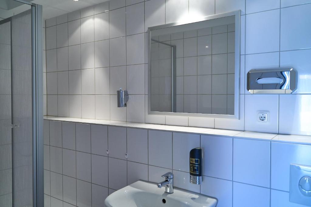 Koupelna v ubytování Hotel Maximo