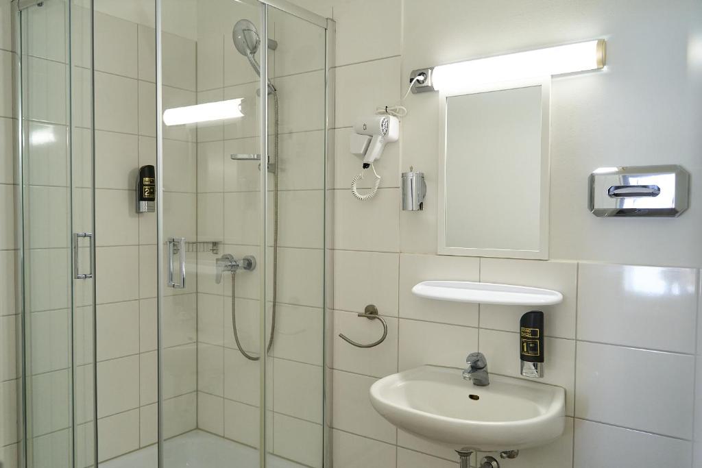 Koupelna v ubytování Hotel Maximo