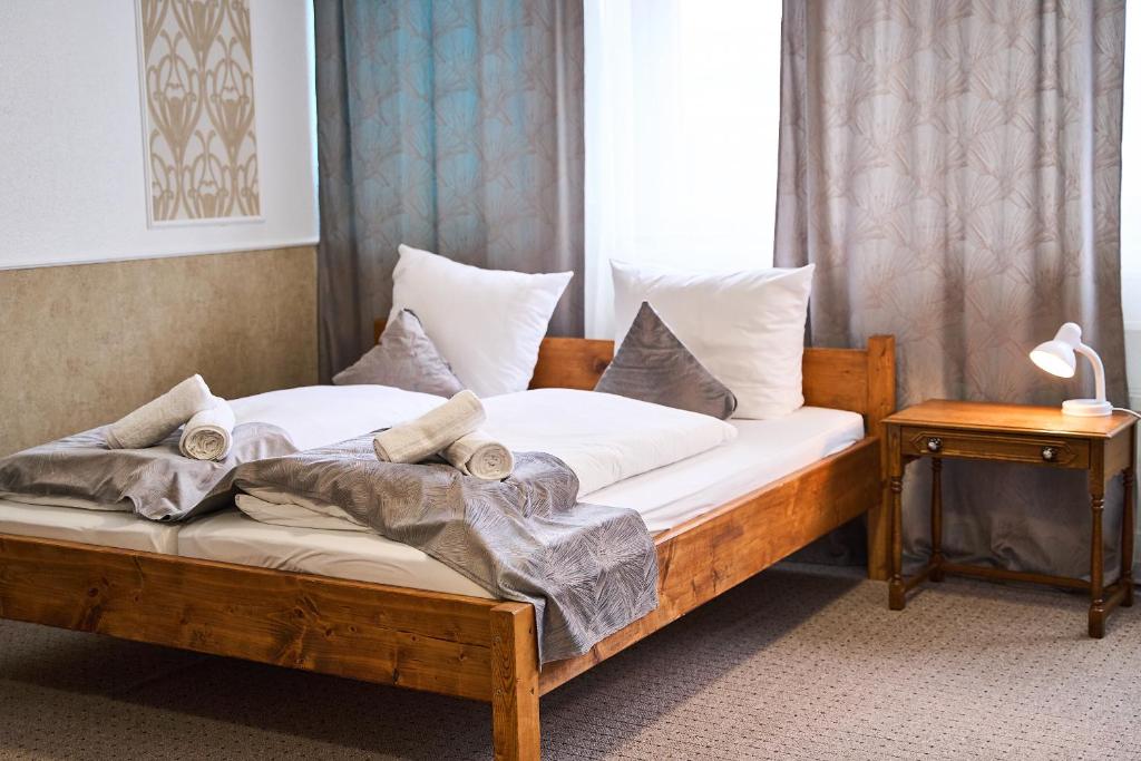Postel nebo postele na pokoji v ubytování Hotel Maximo