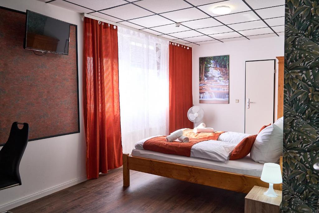 Postel nebo postele na pokoji v ubytování Hotel Maximo