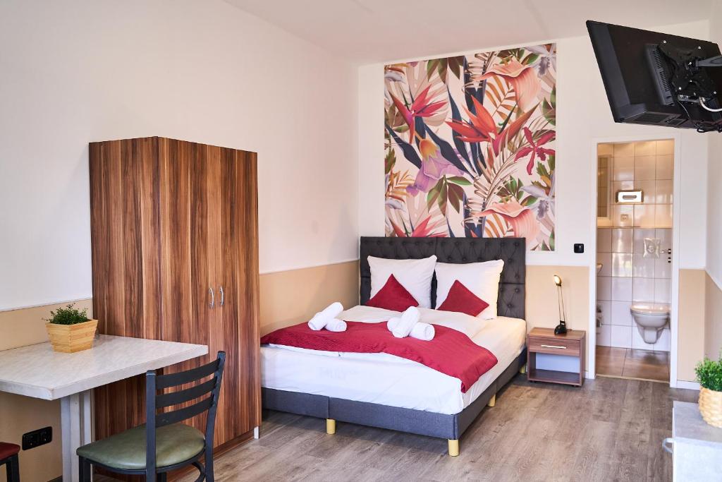 Postel nebo postele na pokoji v ubytování Hotel Maximo