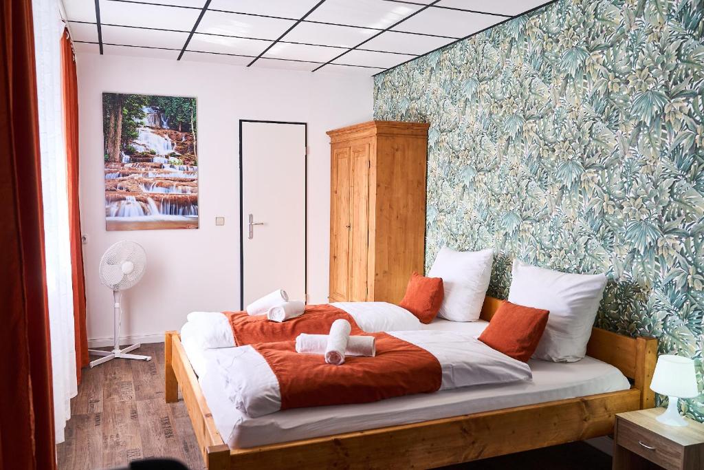 Postel nebo postele na pokoji v ubytování Hotel Maximo