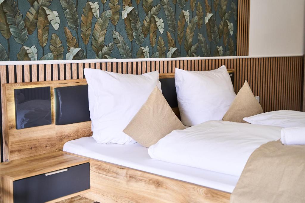Postel nebo postele na pokoji v ubytování Hotel Maximo