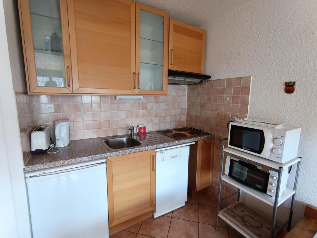 Kuchyňa alebo kuchynka v ubytovaní Résidence Loubatiere - Appartement 2 pièces + cabine pour 4/6 personnes MAE-8924
