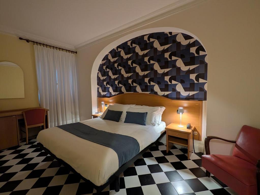 Postel nebo postele na pokoji v ubytování Villa Fieschi Boutique Hotel