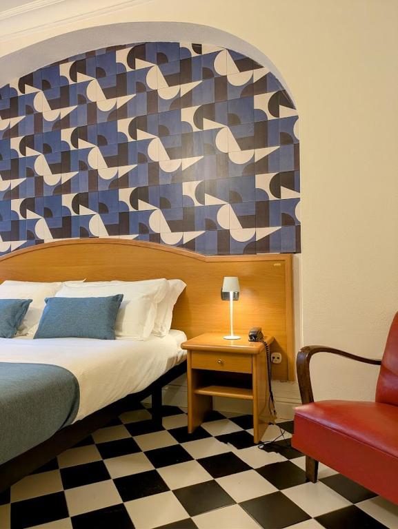 Postel nebo postele na pokoji v ubytování Villa Fieschi Boutique Hotel