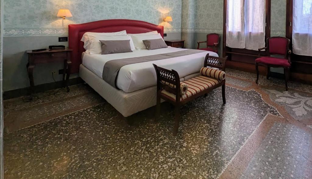 Postel nebo postele na pokoji v ubytování Villa Fieschi Boutique Hotel