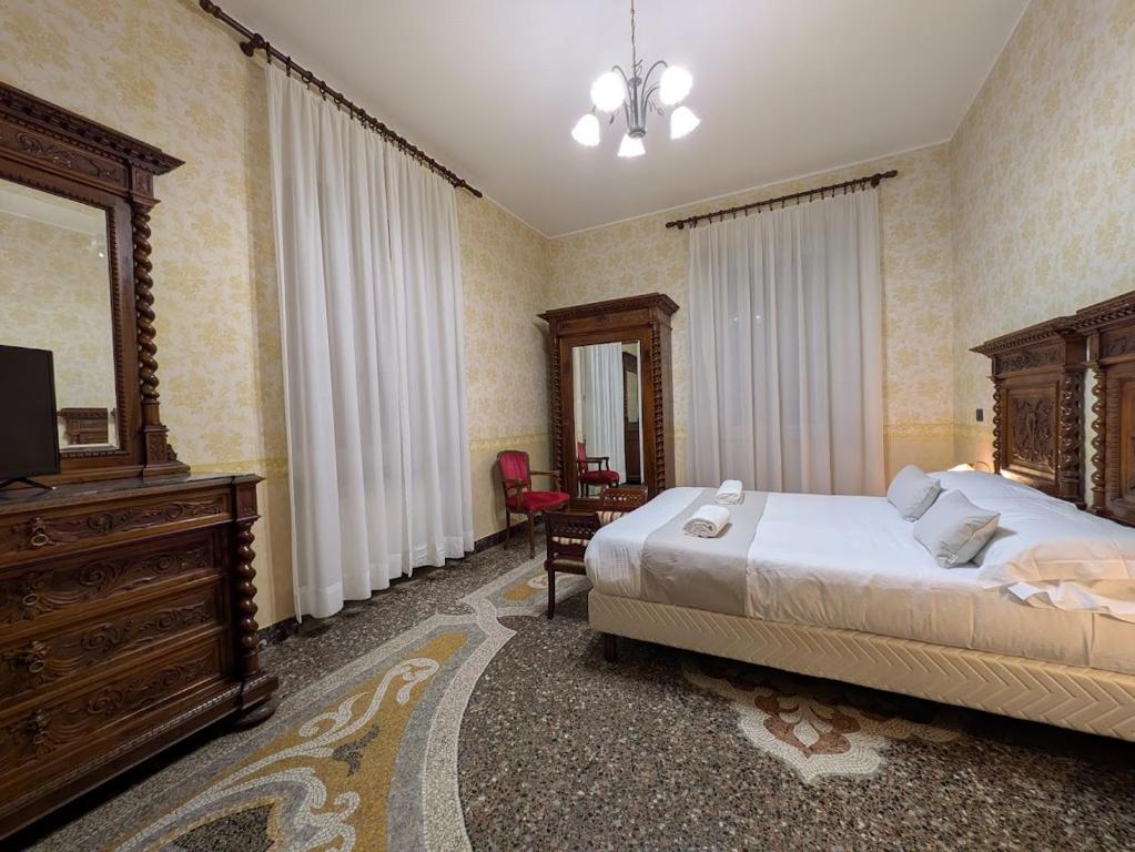 Postel nebo postele na pokoji v ubytování Villa Fieschi Boutique Hotel