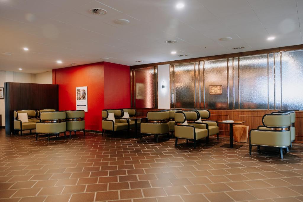 Posezení v ubytování Ramada by Wyndham Baden Hotel du Parc