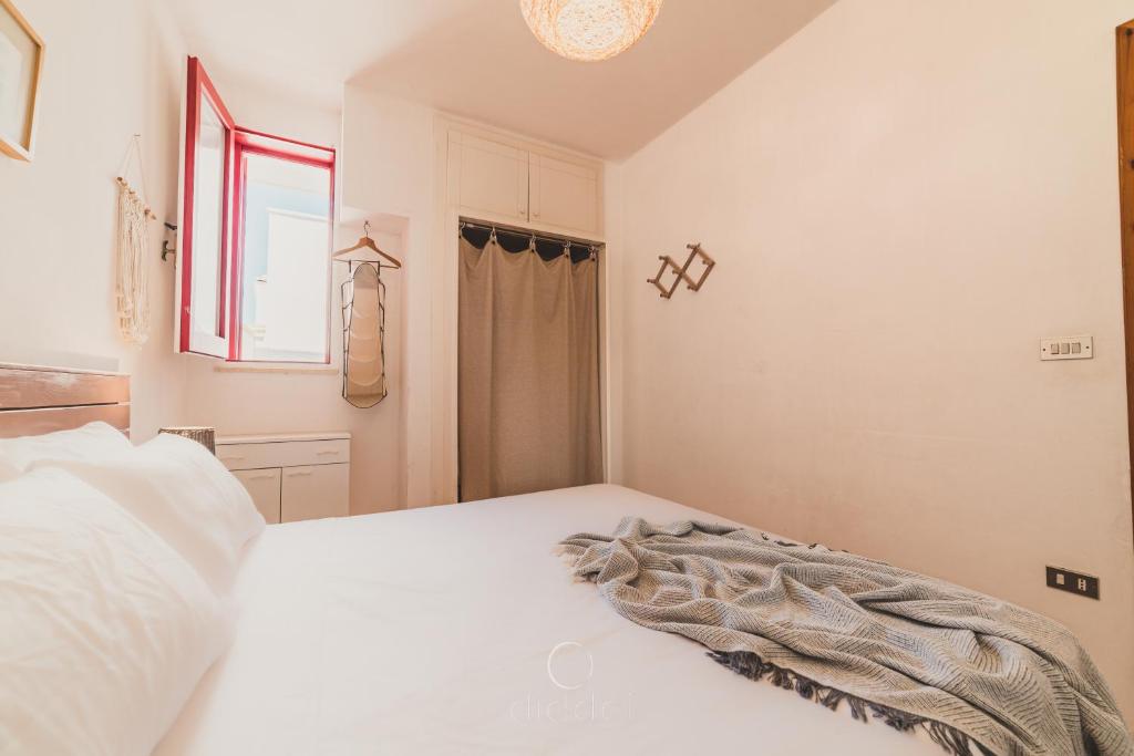 Postel nebo postele na pokoji v ubytování ALL INCLUSIVE - Marelì Apartment by Diddoi