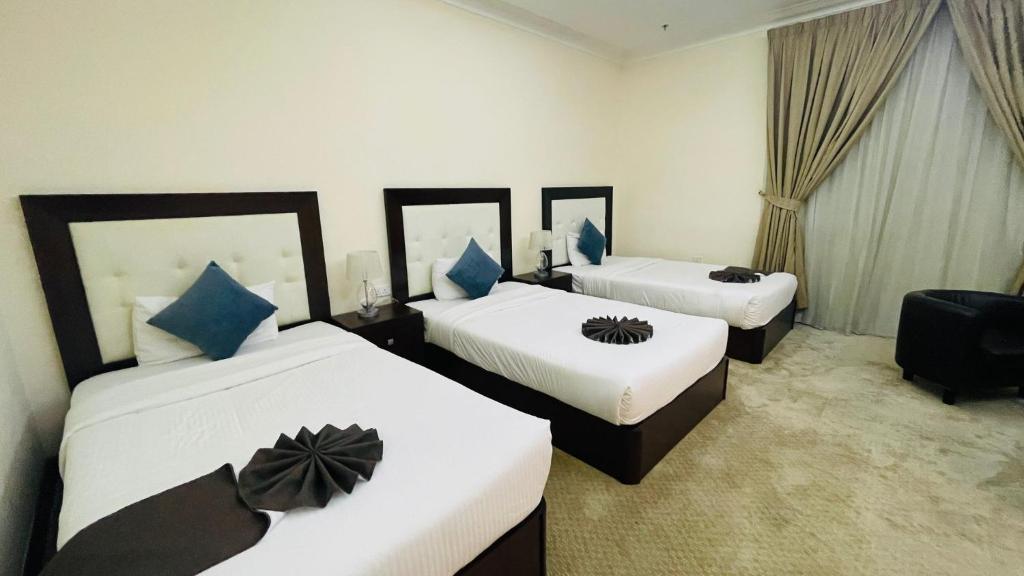 Postel nebo postele na pokoji v ubytování A Line Hotel