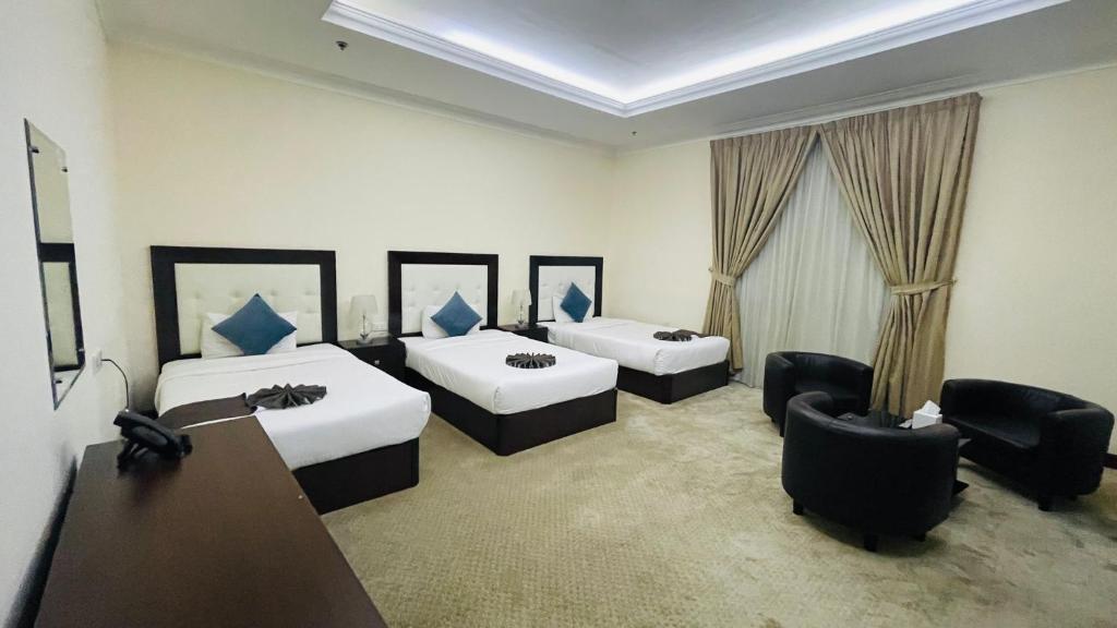 Postel nebo postele na pokoji v ubytování A Line Hotel
