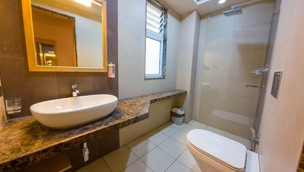 Koupelna v ubytování Lalit Service Apartment