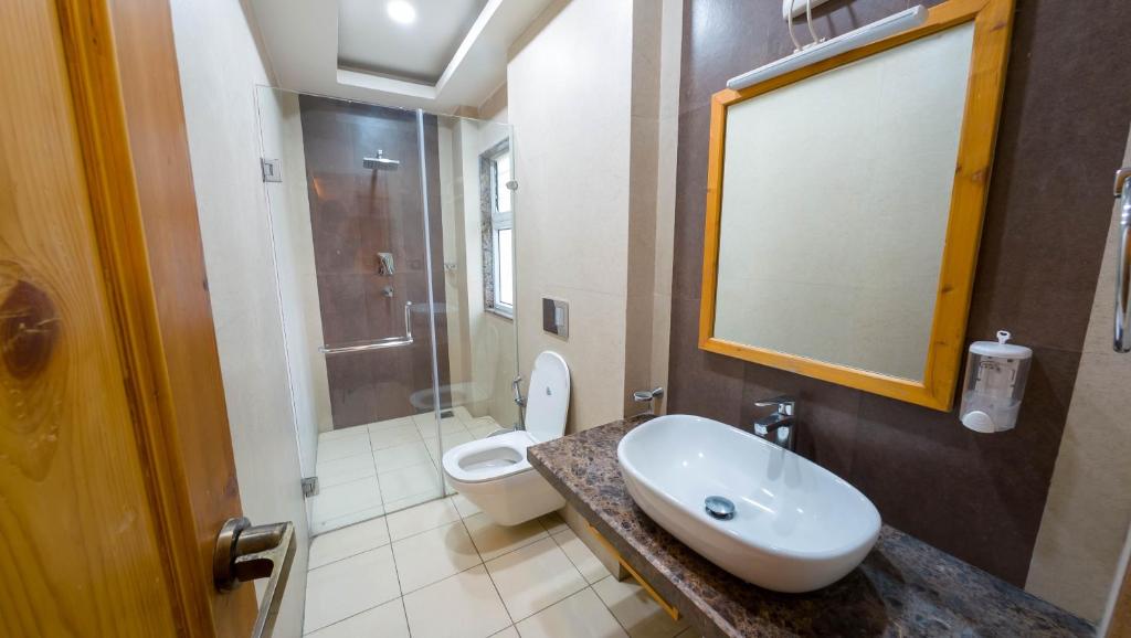 Koupelna v ubytování Lalit Service Apartment