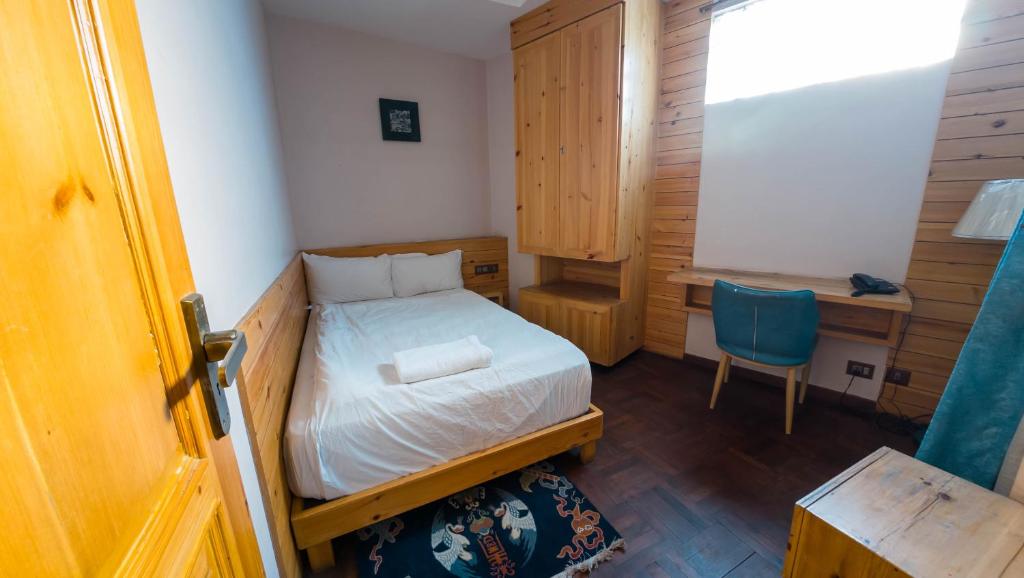 Postel nebo postele na pokoji v ubytování Lalit Service Apartment
